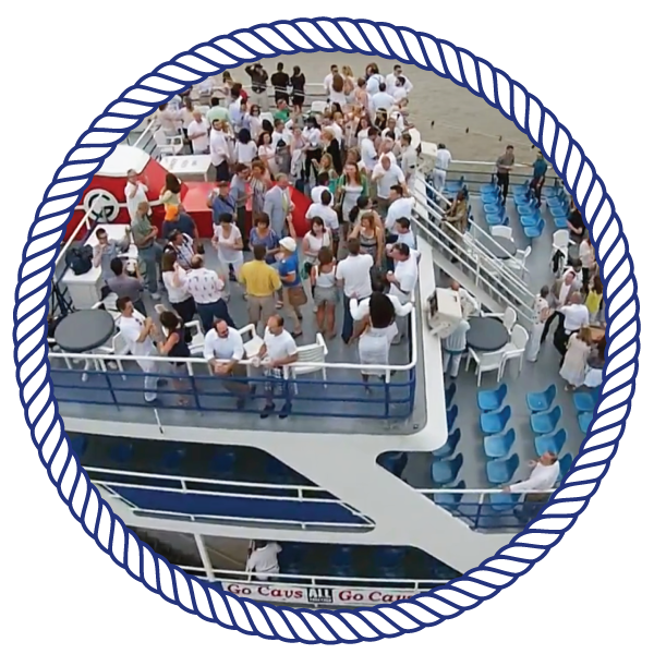 goodtimeiii boat with lots of passengers, cruising down the river